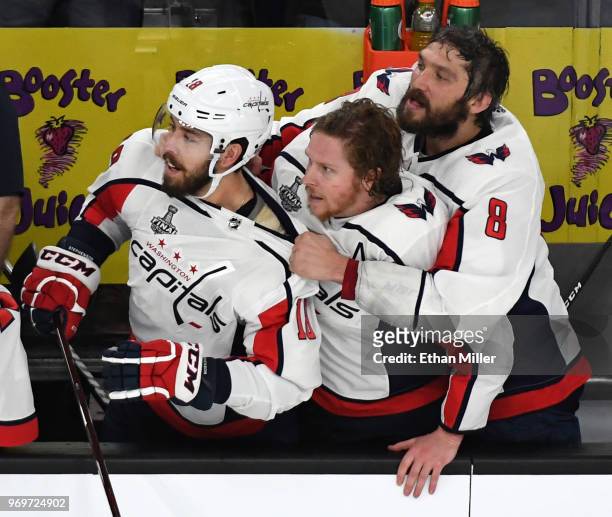 Chandler Stephenson, Nicklas Backstrom and Alex Ovechkin of the Washington Capitals watch the final seconds of Game Five of the 2018 NHL Stanley Cup...