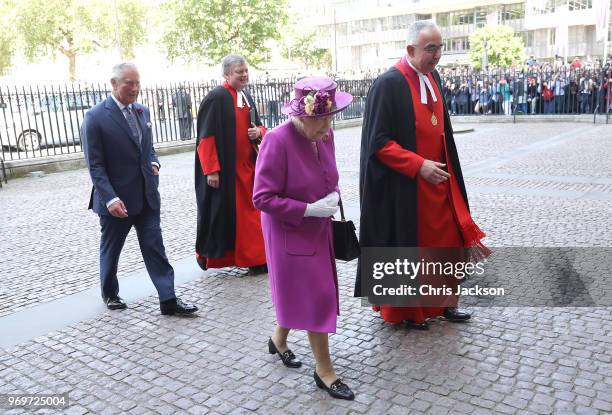 Queen Elizabeth II and Prince Charles, Prince of Wales with the Dean of Westminster Abbey, The Very Reverend Dr John Hall arrive at the opening of...