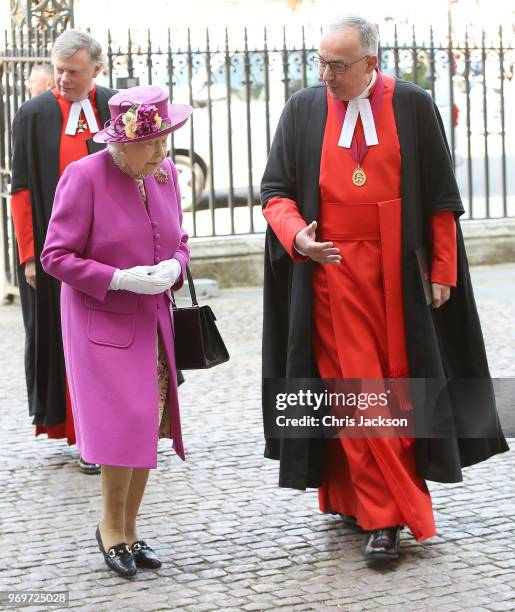 Queen Elizabeth II with the Dean of Westminster Abbey, The Very Reverend Dr John Hall arrive at the opening of the Queen's Diamond Jubilee Galleries...
