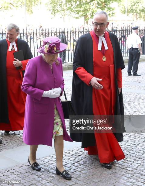Queen Elizabeth II with the Dean of Westminster Abbey, The Very Reverend Dr John Hall arrive at the opening of the Queen's Diamond Jubilee Galleries...