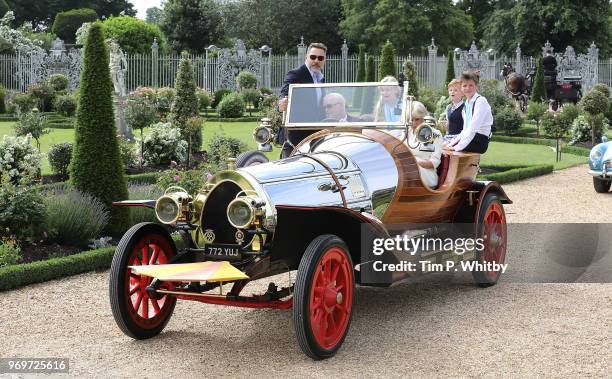 Camilla, Duchess of Cornwall, Chris Evans and David Walliams depart in 'Chitty Chitty Bang Bang' after attending the live broadcast of the final of...