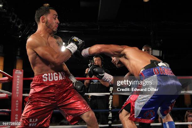 Daniel Gonzalez throws a left hand against Ray Velez at B.B. King Blues Club & Grill in New York City on July 23, 2014. Gonzalez would win by...