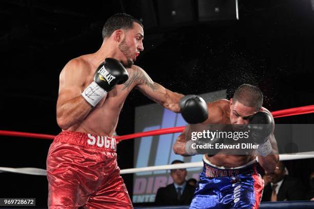 Ray Velez lands a left hand against Daniel Gonzalez at B.B. King Blues Club & Grill in New York City on July 23, 2014. Gonzalez would win by...