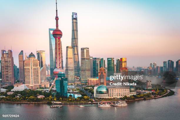 shanghai, china - modern skyline - oriental pearl tower shanghai stock pictures, royalty-free photos & images