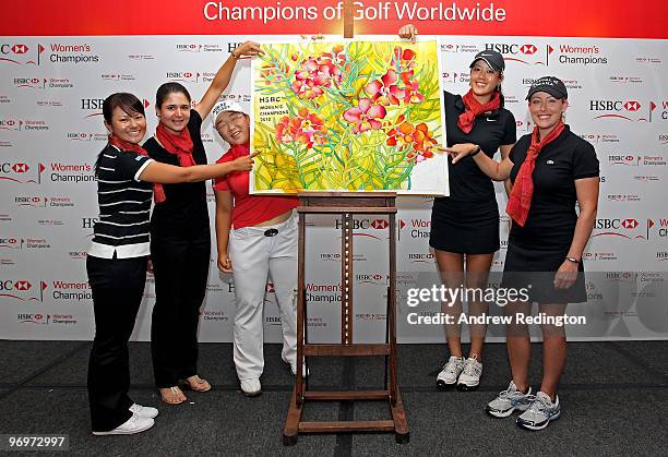 Ai Miyazato of Japan, Lorena Ochoa of Mexico, Jiyai Shin of South Korea, Michelle Wie of the USA and Christie Kerr of the USA pall point to the...