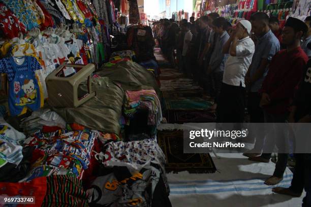 Muslims performing the friday prayer in the Tanah Abang shopping center, Jakarta, on Friday, june 8, 2018. This is the last friday prayer in the holy...