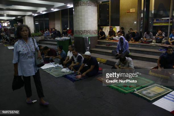 Muslims performing the friday prayer in the Tanah Abang shopping center, Jakarta, on Friday, june 8, 2018. This is the last friday prayer in the holy...