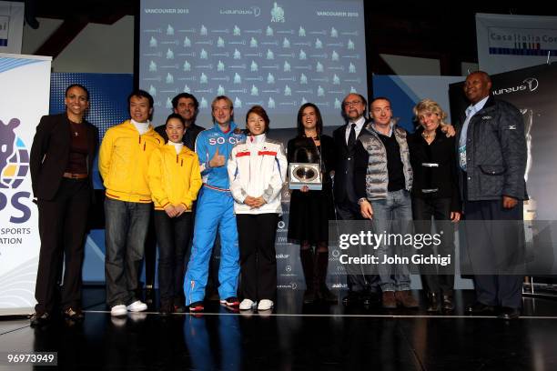 Former Canadian Olympian and member of the VANOC Charmaine Crooks, China's gold medallist pairs skaters Zhao Hongbo and Shen Zhao, Russia's figure...