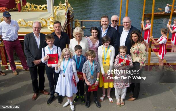 Camilla, Duchess of Cornwall poses for a photograph alonside Gloriana, the Queens Rowbarge with celebrities including Jim Broadbent, Jason, Issacs,...