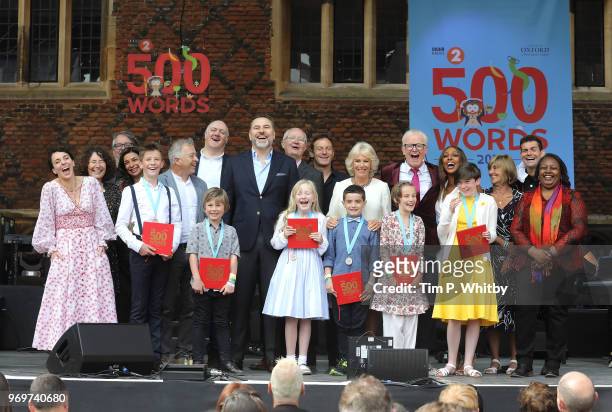 Camilla, Duchess of Cornwall poses for a photograph with celebrities including Amanda Abbingdon, Shobna Gulati, Dara O' Briain, David Walliams, Jim...