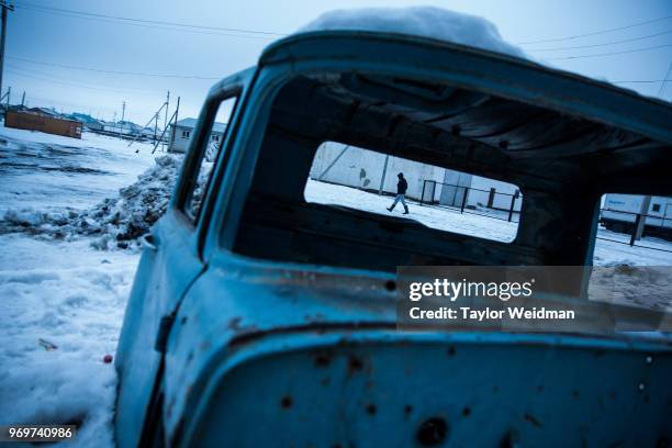 Rusty, abandoned truck sits on a street in Aralsk, Kazakhstan. The Aral Sea, once the fourth-largest lake in the world, started drying out and...