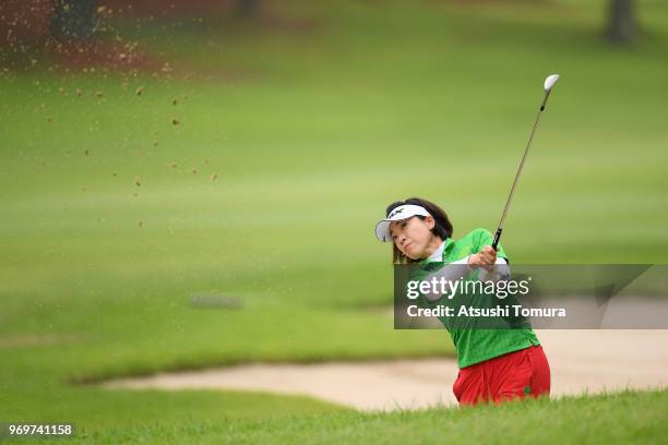 Shiho Oyama of Japan hits from a bunker on the 12th hole during the second round of the Suntory Ladies Open Golf Tournament at the Rokko Kokusai Golf...