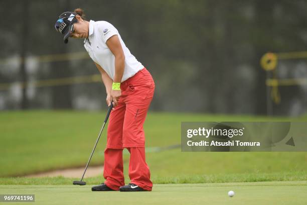 Asako Fujimoto of Japan putts on the 12th hole during the second round of the Suntory Ladies Open Golf Tournament at the Rokko Kokusai Golf Club on...