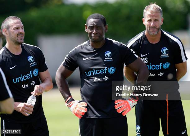 David Harewood of England takes part in training alongside Paddy McGuinness and Mike Stowell goalkeeping coach of England during Soccer Aid for...