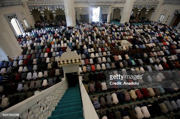 Muslims worshipers perform the last Friday Prayer in the Muslims' holy fasting month of Ramadan at Melike Hatun Mosque in Ankara, Turkey on June 8,...