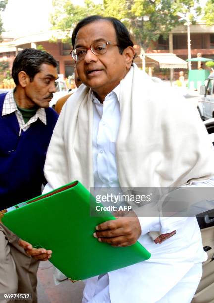 Indian Home Minister P. Chidambaram arrives at Parliament house in New Delhi on February 23, 2010. India's national parliament adjourned in uproar...