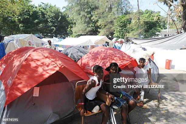 Quake survivors rest at a tent city on February 20, 2010 in Port-au-Prince. Reflecting the massive needs in what was already the poorest country in...