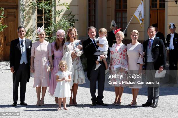 Princess Eleonore of Sweden,Princess Madeleine of Sweden holding Princess Adrienne of Sweden and Christopher O'neil holding Prince Nicolas of Sweden...