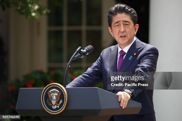Japan's Prime Minister Shinzo Abe holds a joint press conference with US President Donald Trump after a bilateral meeting at the White House.