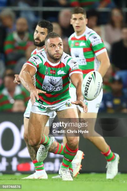 Robbie Farah of the Rabbitohs passes during the round 14 NRL match between the Gold Coast Titans and the South Sydney Rabbitohs at Cbus Super Stadium...