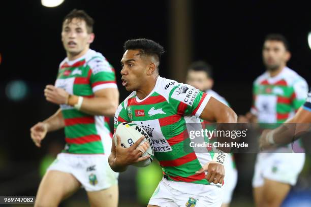 Hymel Hunt of the Rabbitohs runs the ball during the round 14 NRL match between the Gold Coast Titans and the South Sydney Rabbitohs at Cbus Super...