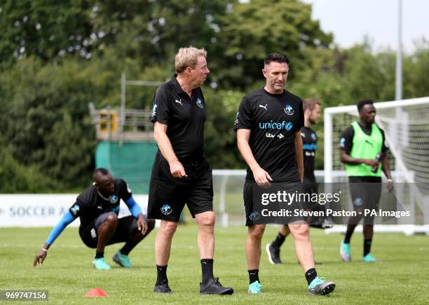 Harry Redknapp and Robbie Keane during the training session during the Soccer Aid for UNICEF training session at Motspur Park, London.