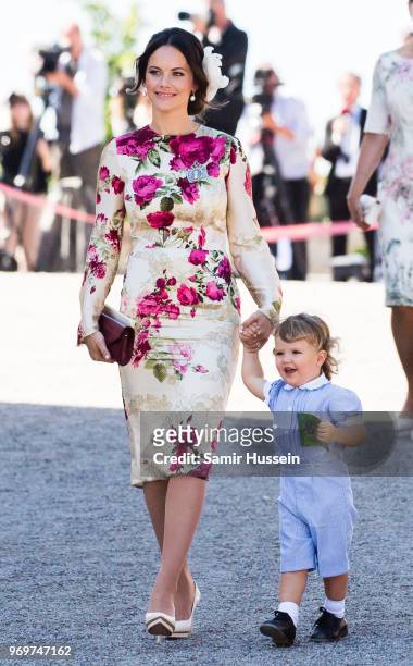 Princess Sofia of Sweden and Prince Alexander of Sweden attend the christening of Princess Adrienne of Sweden at Drottningholm Palace Chapel on June...