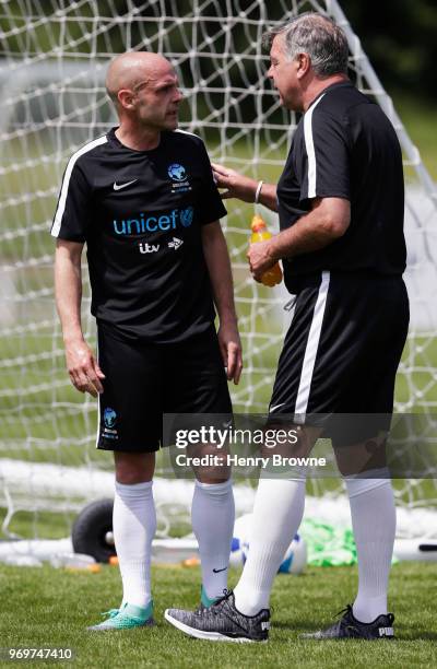 Sam Allardyce manager of England and Danny Murphy of England in discussion in training during Soccer Aid for UNICEF media access at Fulham FC...