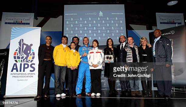 Former Canadian Olympian and member of the VANOC Charmaine Crooks, China's gold medallist pairs skaters Zhao Hongbo and Shen Zhao, Italian Olympic...