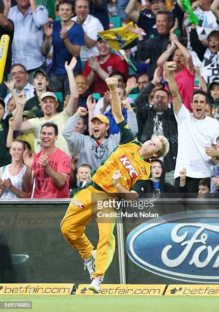 Steven Smith of Australia celebrates taking an outfield catch during the Twenty20 International match between Australia and the West Indies at Sydney...