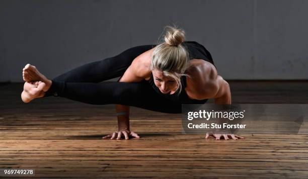 Yoga teacher and Wales and Ospreys Rugby Union player Alecs Donovan pictured demonstrating an Eight Limb Pose/ Ashtavakrasana during a Yoga session...