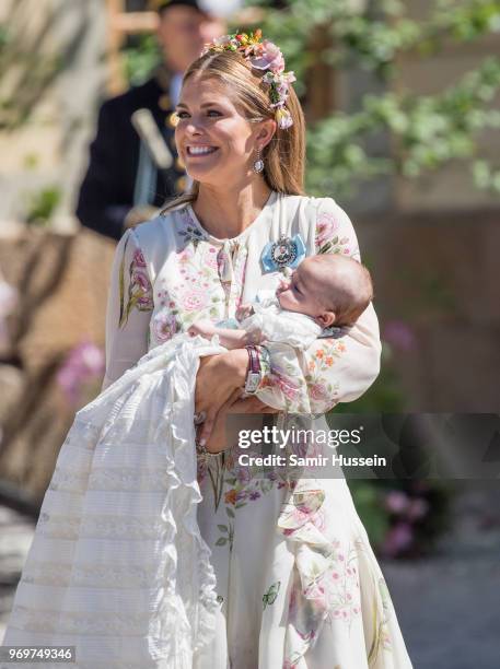 Princess Madeleine of Sweden and Princess Adrienne of Sweden attend the christening of Princess Adrienne of Sweden at Drottningholm Palace Chapel on...