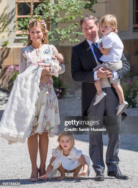 Princess Madeleine of Sweden, holding Princess Adrienne of Sweden, Princess Eleonore of Sweden and Christopher O'Neill holding Prince Nicolas of...