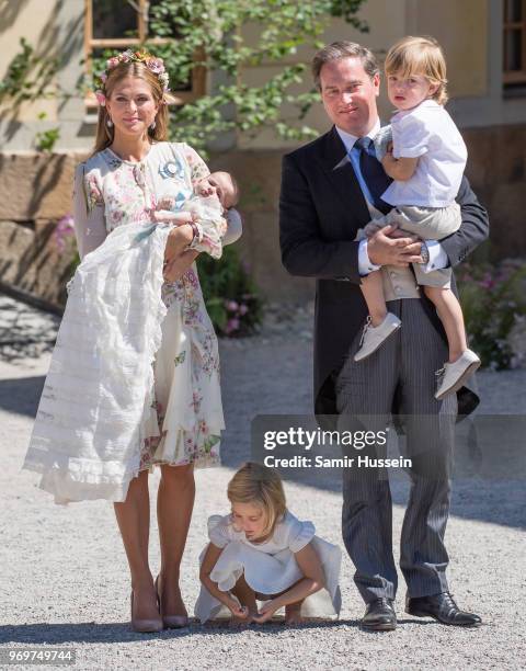 Princess Madeleine of Sweden, holding Princess Adrienne of Sweden, Princess Eleonore of Sweden and Christopher O'Neill holding Prince Nicolas of...