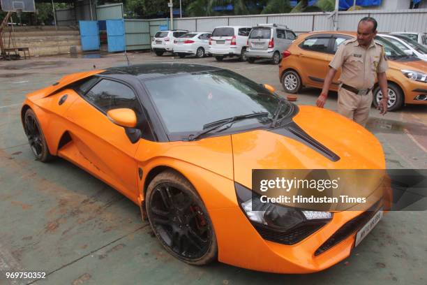 Thane crime branch, investigating the cryptocurrency scam, seized two high-end cars of kingpin Amit Lakhanpal from his home in Airoli and also seized...