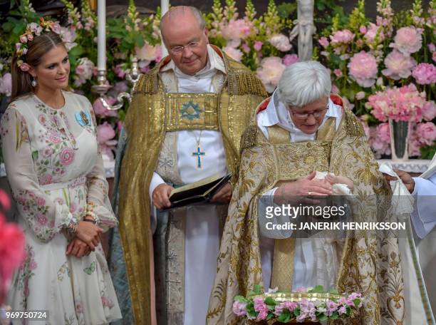 Princess Madeleine of Sweden, Chief Court Chaplain Bishop Johan Dalman and Officiant Archbishop Antje Jackelen are pictured during Princess...