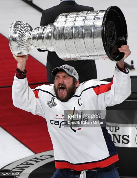 Alex Ovechkin of the Washington Capitals hoists the Stanley Cup after the team's 4-3 win over the Vegas Golden Knights in Game Five of the 2018 NHL...