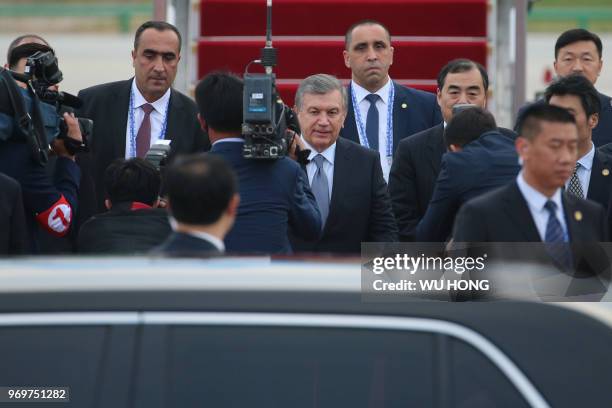 Uzbekistan President Shavkat Mirziyoyev arrives at Qingdao Liuting International Airport in Qingdao, China's Shandong province on June 8, 2018.