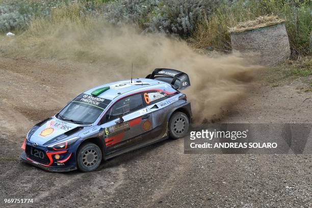 Hayden Paddon from New Zealand and co-driver British Sebastian Marshall, steer their Hyundai N i20 Coupe WRC, near Castelsardo village, on the second...