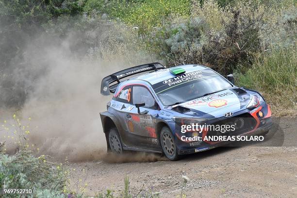 Hayden Paddon from New Zealand and co-driver British Sebastian Marshall, steer their Hyundai N i20 Coupe WRC, near Castelsardo village, on the second...