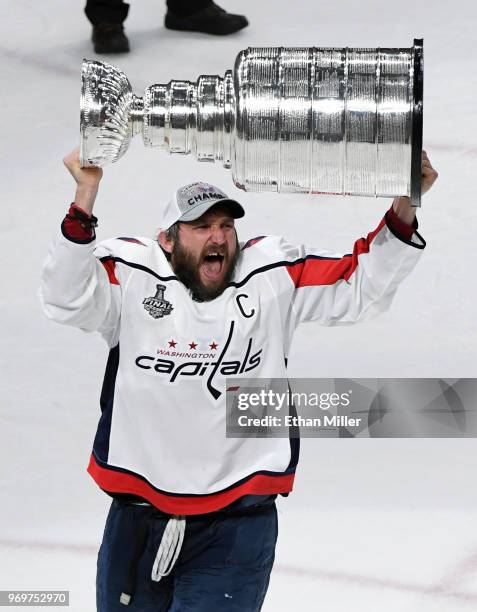 Alex Ovechkin of the Washington Capitals hoists the Stanley Cup after the team's 4-3 win over the Vegas Golden Knights in Game Five of the 2018 NHL...