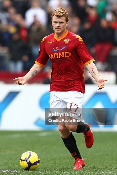 John Arne Riise of AS Roma in action during the Serie A match between AS Roma and Catania Calcio at Stadio Olimpico on February 21, 2010 in Rome,...