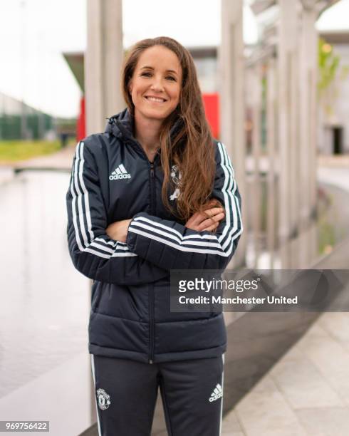 Casey Stoney MBE poses after being appointed Head Coach of the Manchester United Women's team at Aon Training Complex on June 8, 2018 in Manchester,...