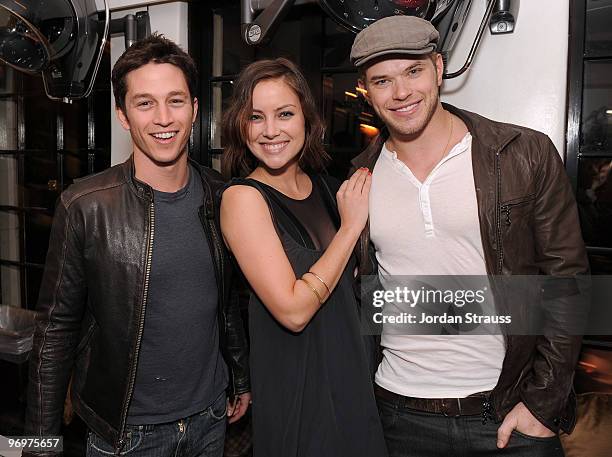 Actors Bobby Campo, Jessica Stroup and Kellan Lutz pose at the Nine Zero One Salon Grand Opening and Book Party at Nine Zero One Salon on February...