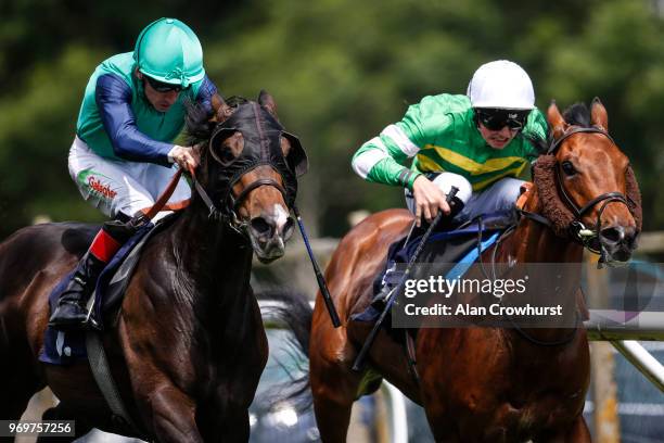 Shane Kelly riding Jack Taylor win The Motorclean Ltd Handicap Stakes at Brighton Racecourse on June 8, 2018 in Brighton, United Kingdom.