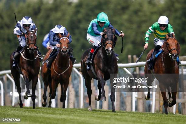 Shane Kelly riding Jack Taylor win The Motorclean Ltd Handicap Stakes at Brighton Racecourse on June 8, 2018 in Brighton, United Kingdom.