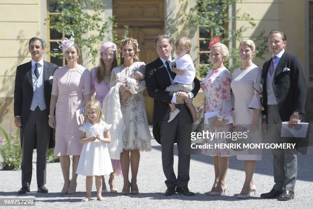 Princess Madeleine of Sweden and princess Adrienne , princess Leonore, Mr Christopher O'Neill and prince Nicolas flanked by the godparents Nader...