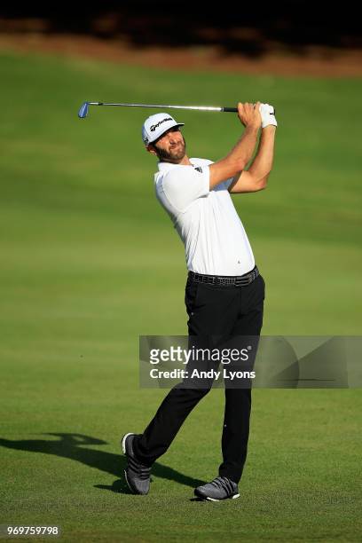 Dustin Johnson plays his second shot on the tenth hole during the second round of the FedEx St. Jude Classic at at TPC Southwind on June 8, 2018 in...