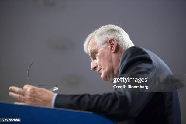 Michel Barnier, chief negotiator for the European Union , holds his spectacles while speaking during a news conference in Brussels, Belgium, on...