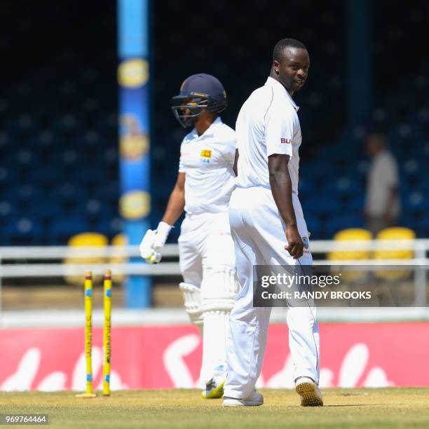 Roshen Silva of Sri Lanka is bowled by Kemar Roach of West Indies during day 3 of the 1st Test between West Indies and Sri Lanka at Queen's Park...